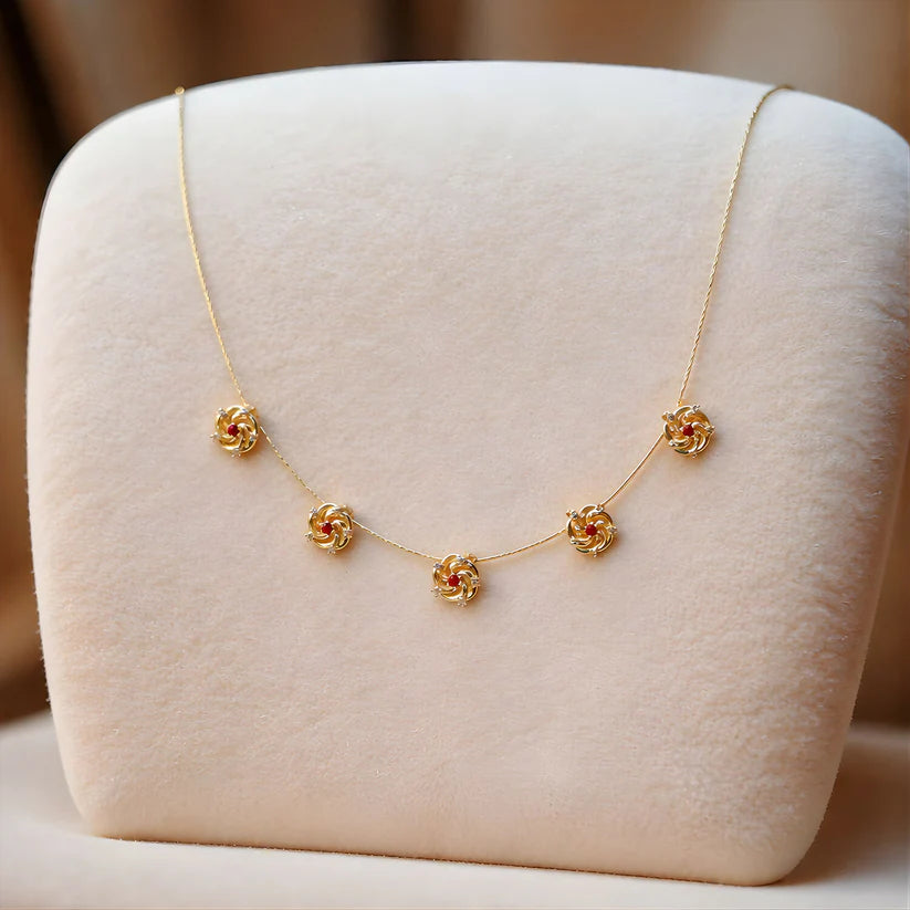 Elegant Ruby Floral Necklace with Diamond Detailing
